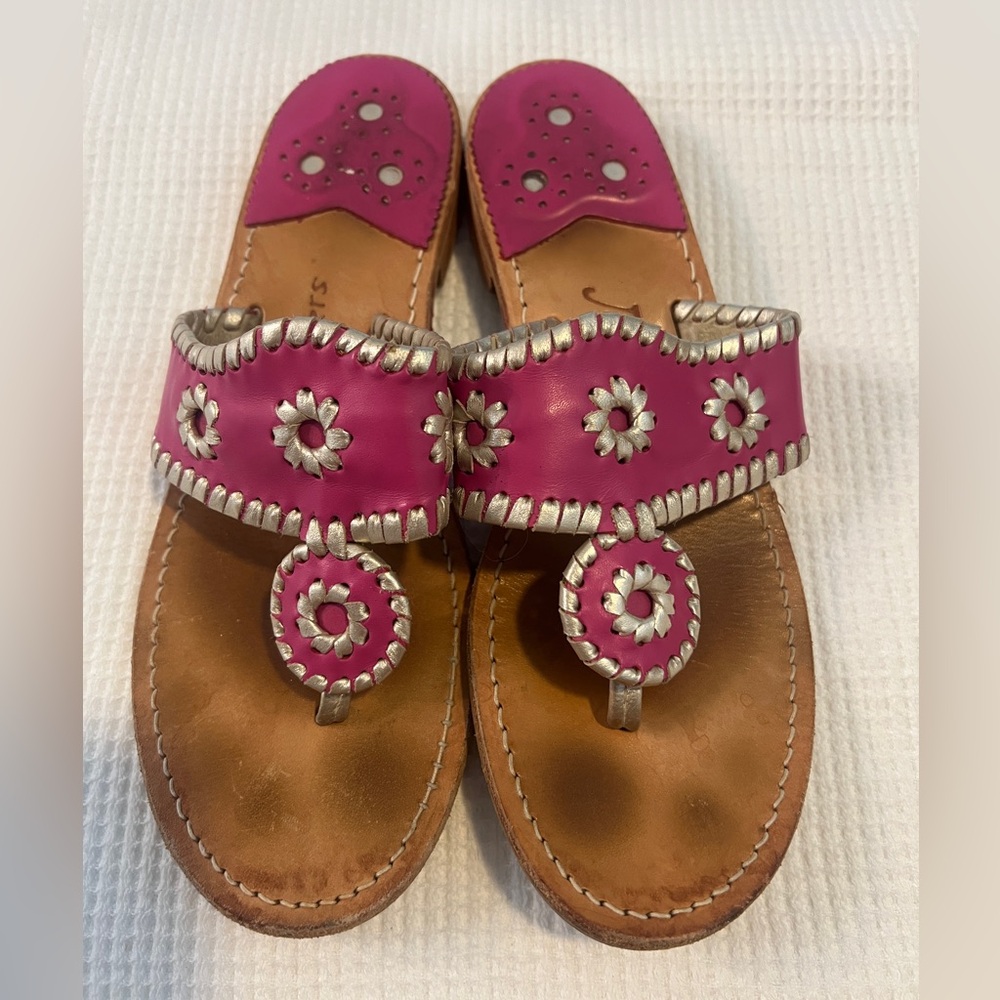 Pink and light gold Jack Rogers sandals.